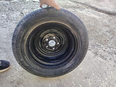 шина уаз: Докатка (запасное колесо на штатном стальном диске) - Шина: Dunlop — 3
