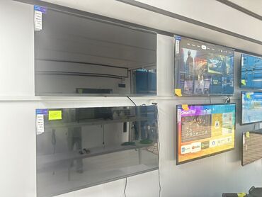 телевизор стенный: Smart-телевизор с плоским экраном, предназначенный для настенного