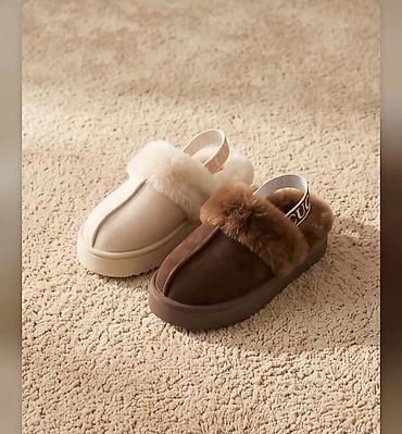 bele ugg cizme: UGG ženske papuče sa elastikom preko pete - Model: zatvorene — 2