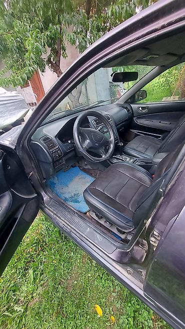 каракол мото: Mitsubishi Galant: 2002 г. — 5