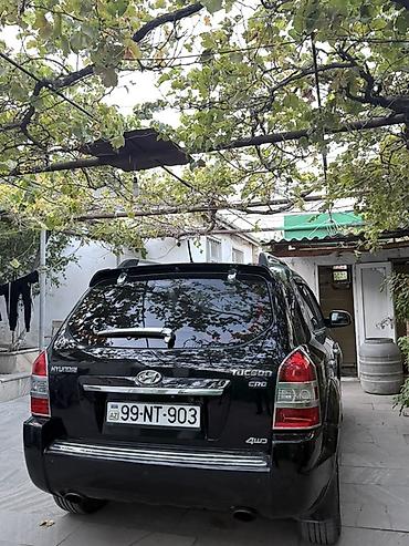 e39 rul: Hyundai Tucson: 2 л | 2009 г. Кроссовер — 2