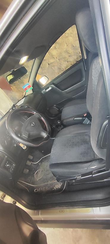 avto aksesuarlar: Opel Astra: 1.6 l | 1999 il 239000 km Sedan — 7
