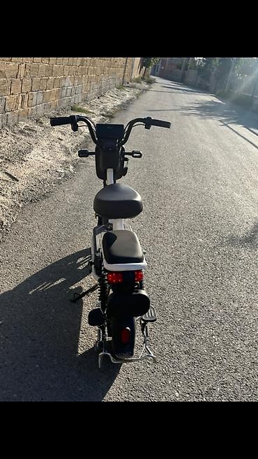 ucuza elektrikli scooter: 2 neferlik Az isdifade olunub tecli satram 60 gedir . 55.km 60km — 1
