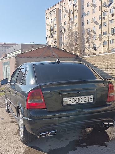 Opel: Model: Opel Astra G sedan Kuzov: 4 qapı, tünd yaşıl rəng Mühərrik və — 3