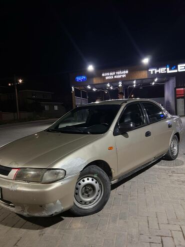 авто россия: Mazda 323: 1998 г., 1.5 л, Автомат, Бензин, Седан