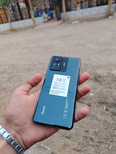 xiaomi pad: Xiaomi Redmi smartfon - Model: Redmi (arxa qapaqda Redmi loqosu və — 2