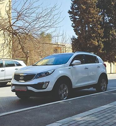 man sat: Kia Sportage: 2 l | 2011 il Ofrouder/SUV — 4
