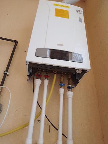 İstilik sistemi: Her cur Santexnik işləri görülür . Kombi xetlerinin cekilmesi — 25