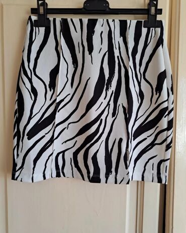 karirane suknje prodaja: Mini suknja.
Zebra print 
ima slic puna elastina. Nova 
S velicina