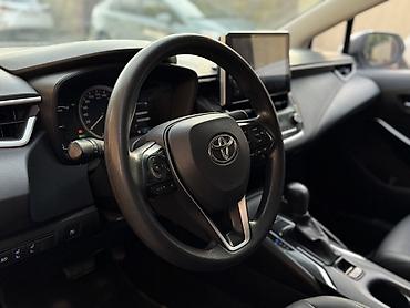 мес лупарик: Toyota Corolla: 2022 г., 1.8 л, Вариатор, Гибрид, Седан — 10