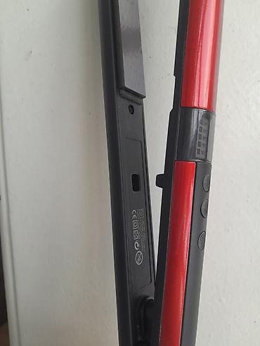 dyson airstrait qiyməti: Saç düzləndirici (elektrikli) - Rəng: qara/qırmızı - Temperaturlar — 3