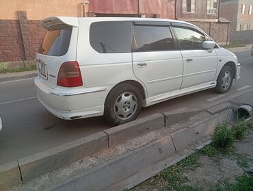 хонда минвен: Минивэн Honda Odyssey белого цвета. Автомобиль имеет просторный салон