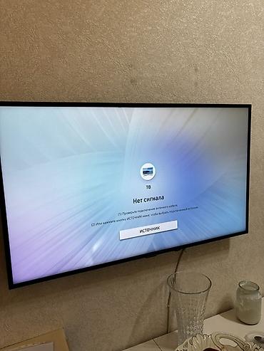 x96 android box: Divar asqısı ilə quraşdırılmış düz ekran televizor. Xüsusiyyətlər: - — 1