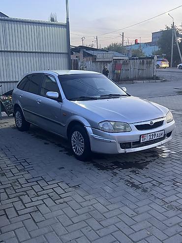 saab 93: Mazda 323: 2000 г., 1.6 л, Механика, Бензин — 10
