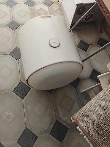 hamam kranti: AquaHot elektrik su qızdırıcısı (divardan asılan tip) - Marka/model — 1