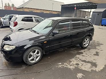 maxda demio: Mazda 323: 2001 г., Механика, Бензин, Хэтчбэк — 2