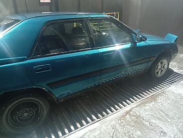 Mazda 323: 2001 г., 1.6 л, Механика, Бензин, Седан