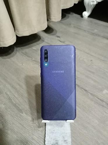 samsung c5610: Samsung Galaxy A30s, 128 GB, rəng - Bənövşəyi, İki sim kartlı — 1