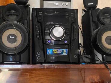 notbuk gence: LG musiqi mərkəzi, DVD, CD və MP3 disklərini oxumağa qadirdir. Radiosu