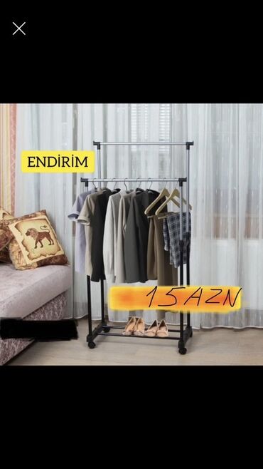 Asılqanlar: Portativ paltar asılqanı (işlənmiş) satılır. 2 ədəd ağ rəngi var. 15