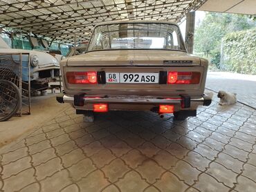 21 06 жигули: Автомобиль ВАЗ-2106 бежевого цвета. Эта модель – классика советского