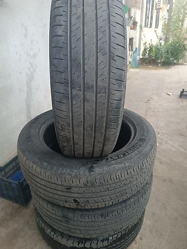 diski teker type 1: 225/60 R18 ölçüdə avtomobil şinləri. Şinlərin üzərində M+S işarəsi — 5