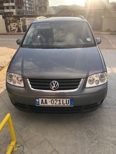 Transport: Volkswagen Touran: 2 l | 2004 year Hatchback