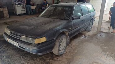 зарядное устройство для электромобиля: Mazda 626: 1988 г., 2 л, Механика, Бензин, Вэн/Минивэн