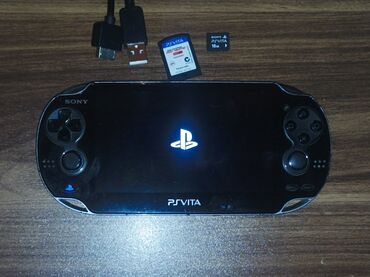 PS Vita (Sony Playstation Vita): Ps vita oled 16 gb kart və NFS most wanted. Adapter digər aksesuarı