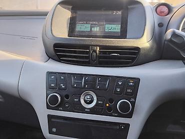 айни 95: Nissan Almera Tino: 2003 г., 1.8 л, Автомат, Бензин, Универсал — 2