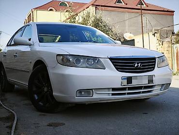 Hyundai: Hyundai Grandeur milvari biznes-sedan. Xüsusiyyətlər və avadanlıq: - — 9