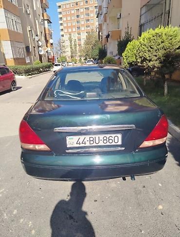 nissan 1998: Nissan Sunny: 1.3 l | 2005 il Sedan — 10