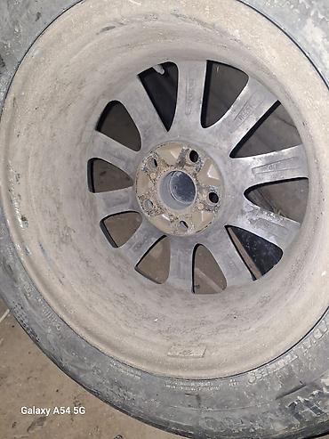 Колеса в сборе: Литой диск Toyota с шиной Kumho Solus - Оригинальный литой диск — 1