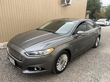 зона: Ford Fusion: 2013 г., 2 л, Автомат, Гибрид, Седан — 2
