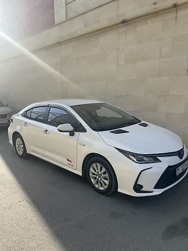 camry 2011: Toyota Corolla: 2019 г., 1.8 л, Вариатор, Гибрид, Седан — 1