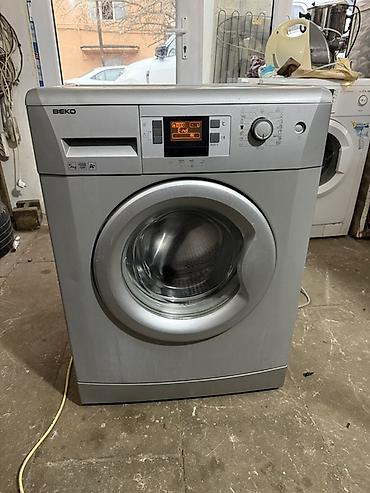 Beko önyükləməli paltaryuyan maşın - Rəng: gümüşü - Elektron displey