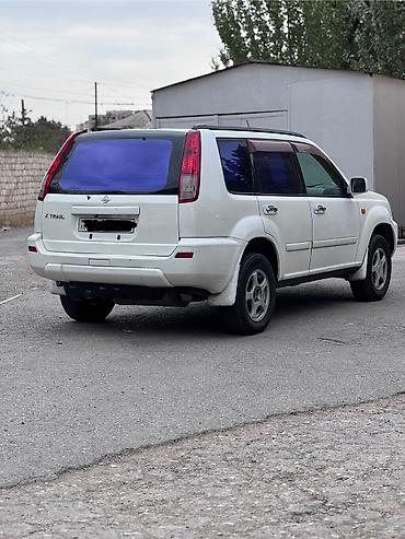 şevralit avtomobil: Nissan X-Trail: 2 l | 2002 il Universal — 5