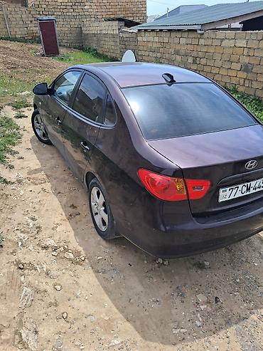 Hyundai: Hyundai Elantra sedan - Kuzov: 4 qapılı sedan, tünd bənövşəyi rəng - — 1