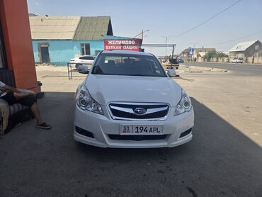 полик на форестер: Белый седан Subaru Legacy с элегантным дизайном и выразительной