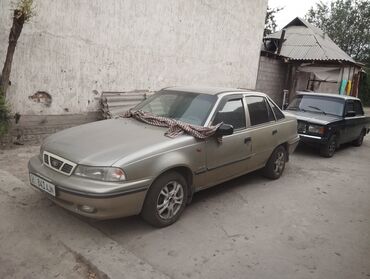радиатор на дэу нексия цена: Автомобиль Daewoo Nexia золотистого цвета, четырехдверный седан