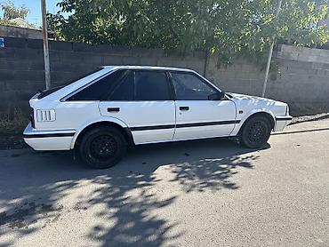 Nissan Bluebird: 1990 г., 2 л, Автомат, Бензин, Хэтчбэк