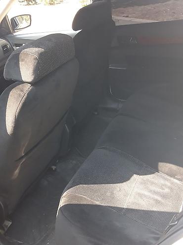turbo az uvaz: Ağ rəngli sedan avtomobil Xarici: - Ağ gövdə, arxa park sensorları - — 4