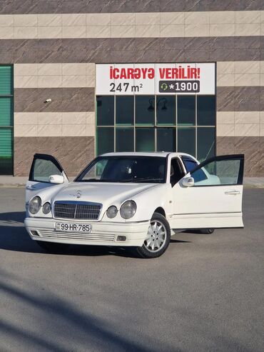 Mercedes-Benz: Mercedes-Benz E‑Class (W210) sedan - Rəng: ağ - Kuzov: 4 qapılı sedan — 2
