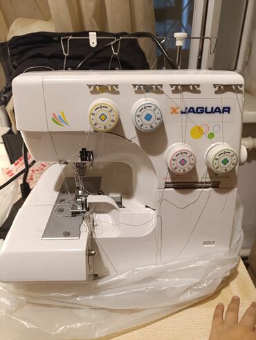 машинка для швеи: Лебединовка Дияр Акимиат продам оверлог фирмы Ягуар,он новый пару