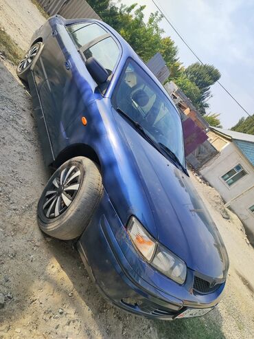 рычак на фит: Mazda Capella: 1997 г., 1.8 л, Механика, Бензин, Седан