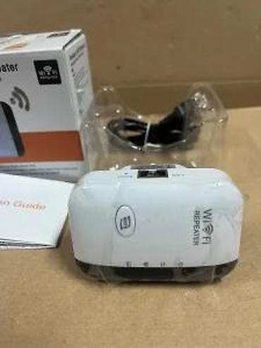 Modemi, ruteri i mrežni uređaji: Wireless‑N WiFi Repeater Opis: - Pojačivač/bežični repetitor koji — 20