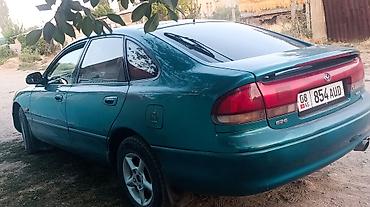 гак м 6: Mazda 626: 1996 г., 1.8 л, Механика, Бензин, Лифтбек — 4
