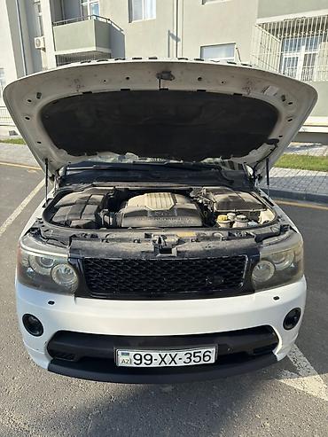 Land Rover: Range Rover Sport – ağ rəngdə, 5 qapılı SUV. Əsas xüsusiyyətlər: - — 6