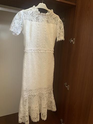 Qadın geyimləri: Ağ rəngli, tam krujeva detallı zərif don. - Model: midi uzunluq, ətək — 2