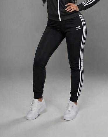 lepe devojke: Adidas ženske trenerke donji deo likra sa elastinom. - Model uski kroj — 2
